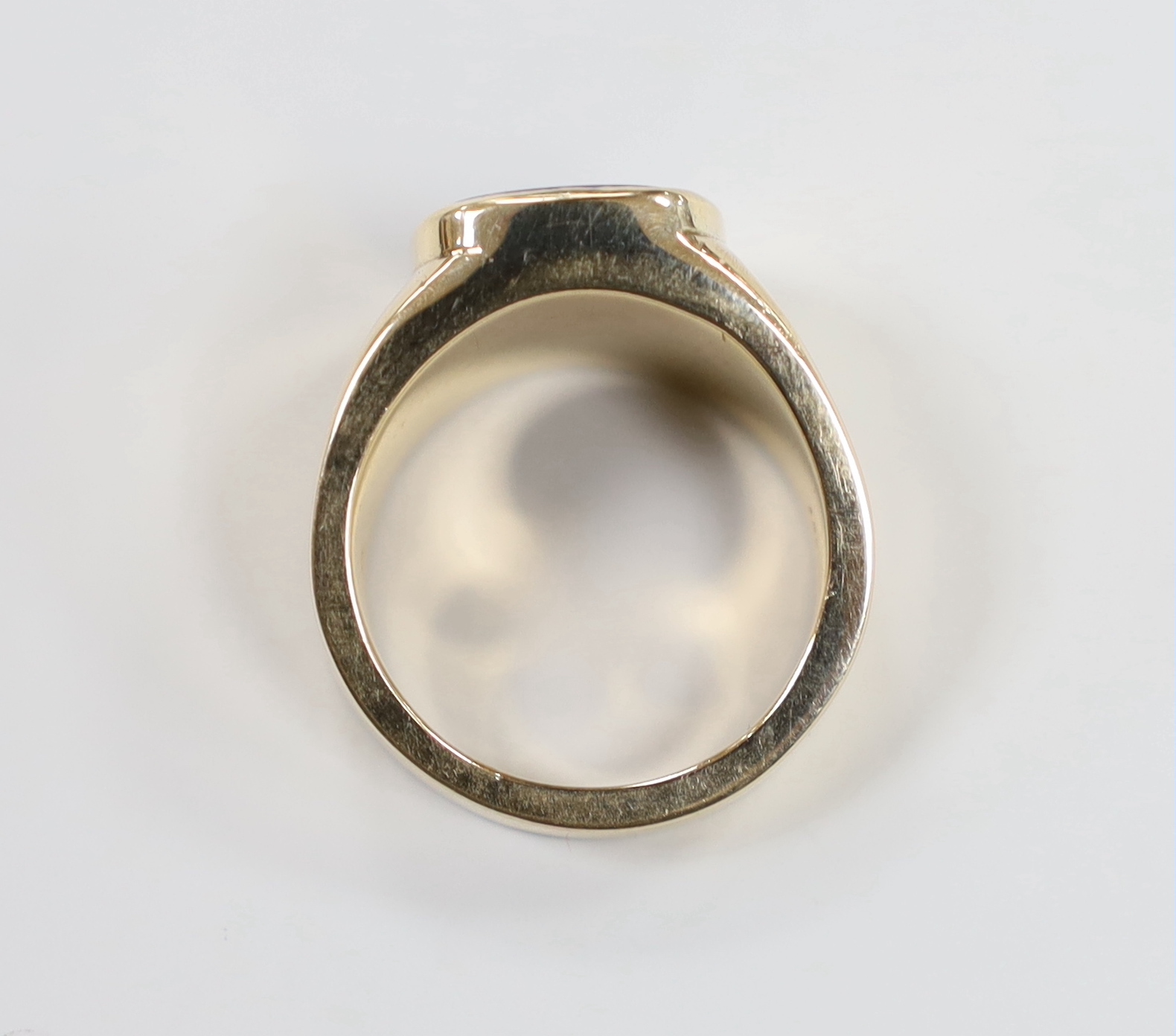 A modern 9ct gold and chalcedony set signet ring, size R, gross weight 15.8 grams.